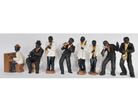 A collection of vintage Jazz band figurines, to include trumpet player, saxophone, singers, pianist etc