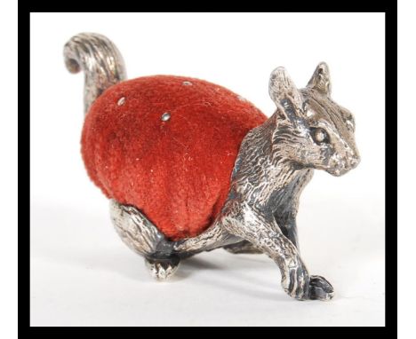 A 19th Century Victorian silver plated novelty pin cushion depicting a squirrel in the manner of Mappin and Webb. Detailed fe