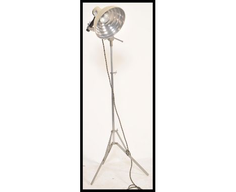 A vintage 20th Century up-cycled floor standing Pifco heat lamp, raised on a chrome tripod support. Measures 150 cm high.