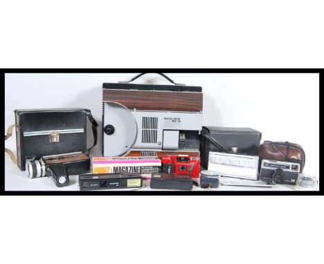 A collection of vintage film cameras and equipment to include a Bolex 18-9 projector, a kodak instamatic camera, a Ricoh AF s