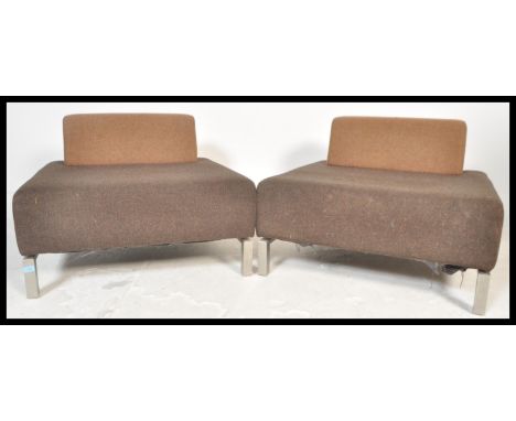 A pair of contemporary modern modular seating sofa / chairs in the manner of Orange Box furniture raised on chrome supports w