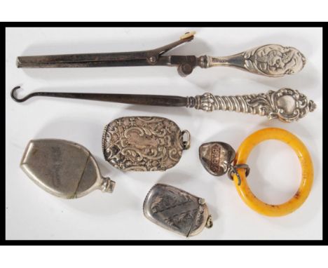 A 20th Century selection of silver and related items to include a steel button hook with a hallmarked silver handle (Birmingh