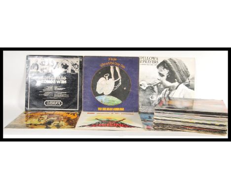 A large collection of vinyl long play / LP records featuring various artists to include The Troggs, Pink Floyd, Cherry Red, T
