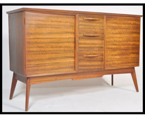 Alfred Cox - A&nbsp; vintage 20th century oak sideboard credenza having a central bank of 3 drawers with pull handles flanked