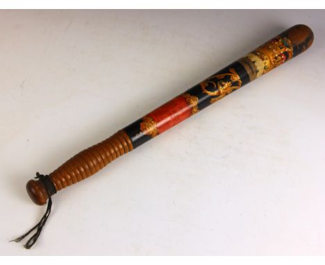 A Victorian police truncheon, painted in gilt with 'VR' cypher beneath a crown, 'Police' inscription within a red cartouche, 