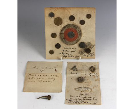 An interesting Battle of Waterloo relic display, comprising; a French Cockade, and ten buttons, mounted to a card with inscri