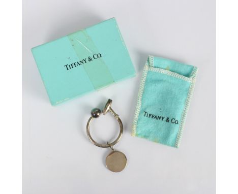 A novelty Tiffany and Co silver key ring, modelled as a polo mallet, with screw off spherical terminal, stamped 'T&amp;Co' Lo
