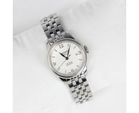 A Tissot Le Locle automatique wristwatch, the circular white coloured dial with baton and Arabic numerals, set to plain polis