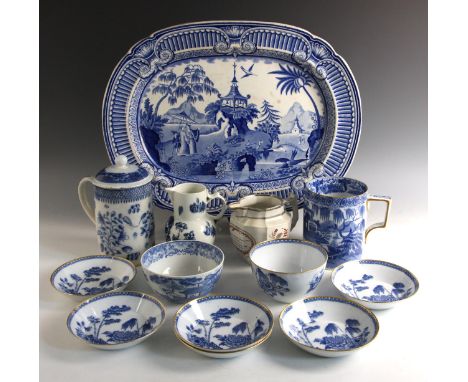 A selection of early English blue and white printed wares, to include a Caughley mask jug, circa 1775, 14.5cm high, an 18th c
