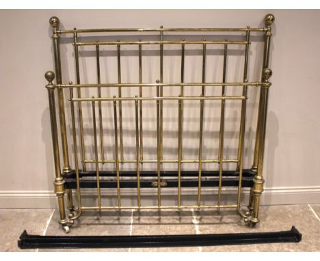 A Victorian brass and iron double bedstead, by R.W Winfield & Co, London, of typical tubular form with spherical finials, bra