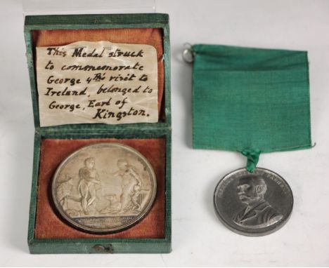 A George IV silver medal commemorating the visit to Ireland in 1821, Obverse: Laureate head of George IV left. GEORGIUS IIII 