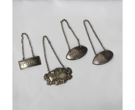 A near pair of George III silver decanter labels, John Hutson, London, the navette shaped 'Sherry' and 'Rum' labels with bead
