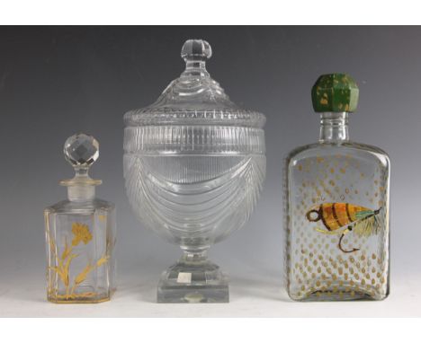 A cut glass bonbonierre and cover, 19th century, of chalice form, the body cut with swags, on domed faceted stem and square b