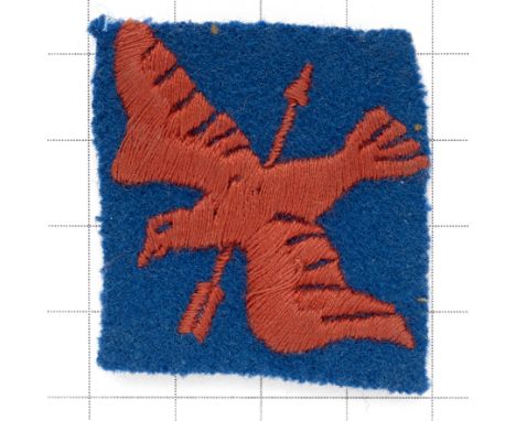 1st Anti-Aircraft Corps scarce WW2 cloth embroidered formation sign.Red bird pierced by an arrow on blue felt square.HQ Hilli