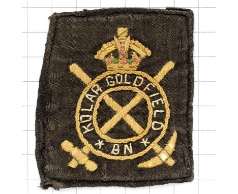 Indian Army. Kolar Gold Field Battalion AFI cloth pagri badgeGolden yellow embroidered on black.GC