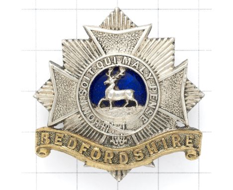 Bedfordshire Regiment pre 1919 Officer’s silver, gilt and blue enamel cap badge.Fine unmarked die-cast exampleReplacement loo