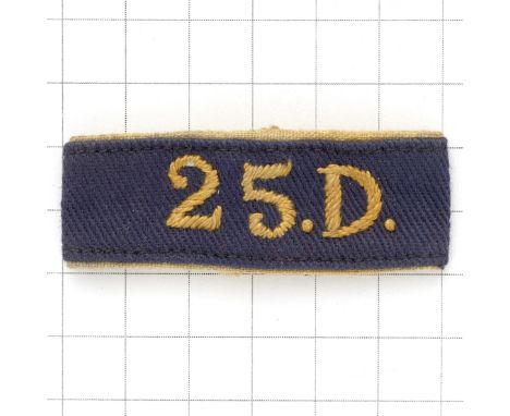 25.D. WW2 NCO’s and OR’s coloured slip on cloth shoulder title.Yellow letters embroidered on navy with yellow edges.Raised at