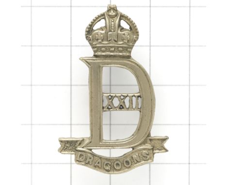 22nd Dragoons WW2 Officer’s cap badge.Die-cast white metal crowned ‘D’ on ‘DRAGOONS’ scroll; ‘XXII’ to voided centre.LoopsVGC