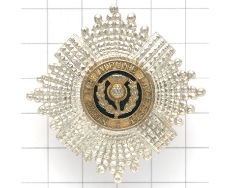 Scots Guards Officer’s 1985 Birmingham hallmarked silver cap star.A fine die-cast example with gilt mounted centre backed wit