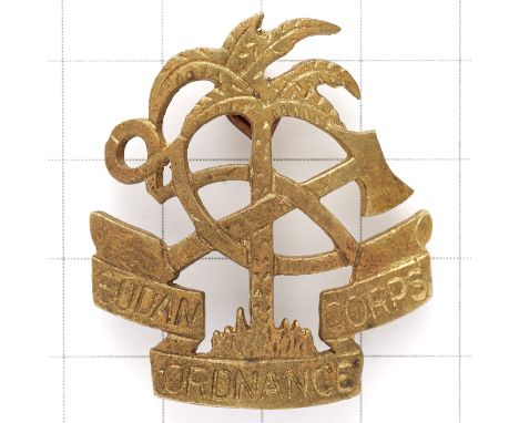Sudan Ordnance Corps cast brass pagri badge.Palm tree, hammer and tongs on title scrollStout pagri pinGC