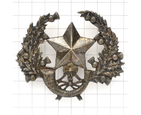 Cameronians (Scottish Rifles) Officer’s glengarry badge.A good die-cast heavy large silvered example. Thistle sprays enclosin