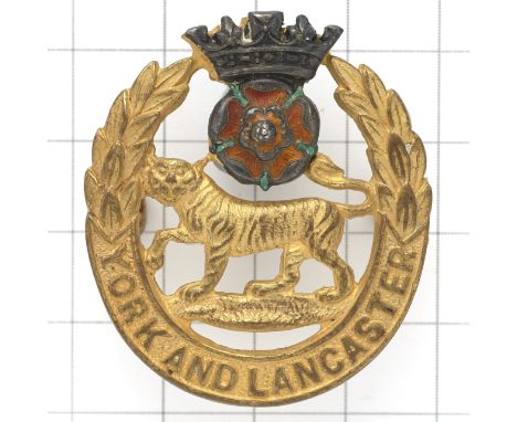York and Lancaster Regiment Officer’s cap badge.Die-cast gilt with applied silvered coronet with red and green enamel rose.Lo