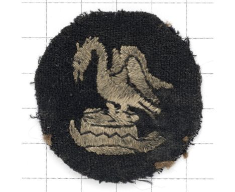 30th Division WW1 felt cloth formation sign.White crest of Lord Derby embroidered on black felt disc. Colour run into whiteNe
