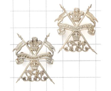 Indian Army. 2 x 26th KGO Light Cavalry Officer’s collar badges.One silver with lion passant on loops, the other silveredLoop