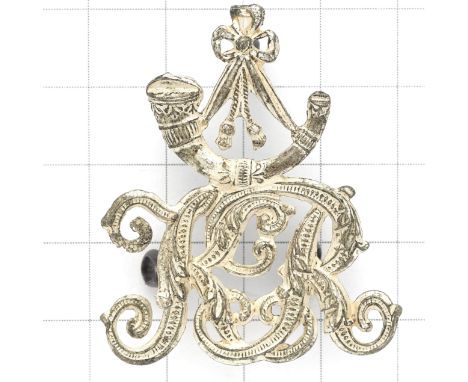 South African. Knysna Rangers Victorian Officer's cap badge.A good scarce die-stamped silvered KR cypher surmounted by strung