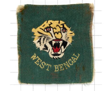 Indian Army. West Bengal Militia cloth pagri badgeFinely embroidered Tiger Head over ‘West Bengal’ on green rectangle. Cream 