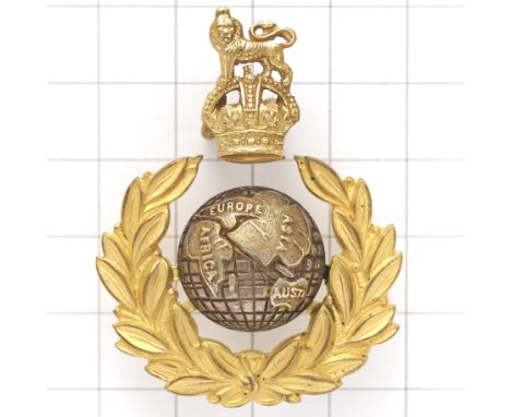 Royal Marines two part Officer’s cap badge circa 1923-52.Good die-cast gilt Royal Crest above separate gilt laurel wreath wit