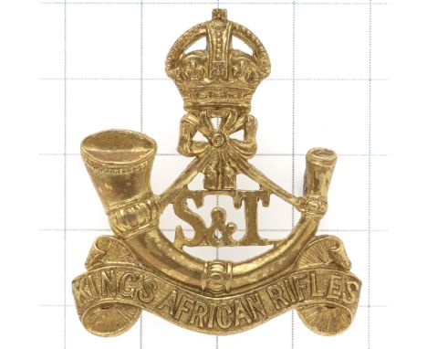 King’s African Rifles Supply & Transport Section scarce pre 1953 cap badge.Die-cast crowned strung bugle on title scroll, ‘S 