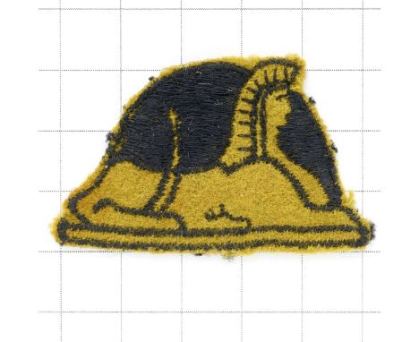 56th Independent Infantry Brigade WW2 cloth embroidered formation sign.Yellow Sphinx on black circle on yellow rectangle whic