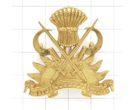 Indian Army Military Farms Department Officer’s cap badge.A fine scarce British made die-cast rich gilt example. (Cox 2598)Lo