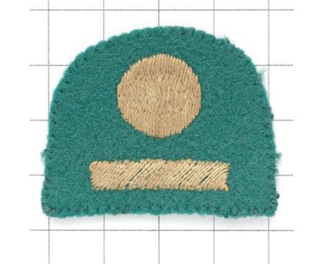 10 Corps scarce WW2 cloth embroidered formation sign.White 10 on its side, on green felt tombstone.Removed from uniform. VGC