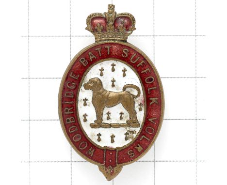 Woodbridge District Volunteers lapel / mufti badge.Crowned red oval title strap; dog on white enamel centre. Issue number to 