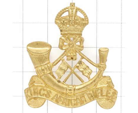 King’s African Rifles Supply & Transport Section scarce pre 1953 cap badge.Die-cast crowned strung bugle on title scroll, cro