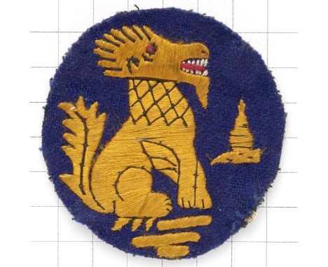Chindits (3rd Indian Division) WW2 cloth embroidered formation sign.Yellow Burmese Dragon (Chinthern) on blue felt disc. Four