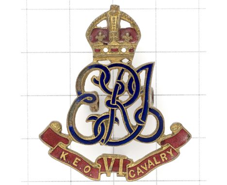 Indian Army. 6th King Edward’s Own Cavalry gilt and enamel field service cap badge circa 1906-21.Die-cast crowned ERI cypher 