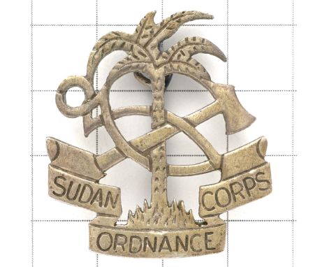 Sudan Ordnance Corps cast white metal pagri badgePalm tree, hammer and tongs on title scrollStout pagri pinGC