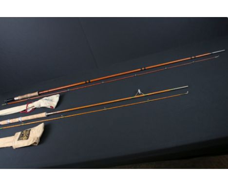 Two vintage split cane fishing rods to include and ESS octopus. 