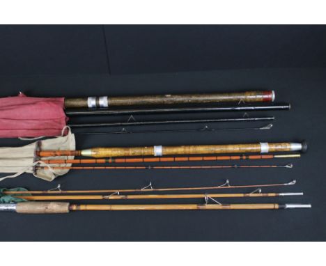 A small collection of vintage fishing rods to include split cane examples. 
