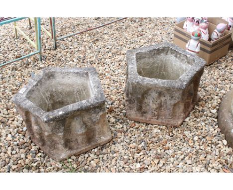 Pair of Composite Stone Garden Planter of pentagon shape, the sides set with medieval style figures,  46cm wide x 29cm high 