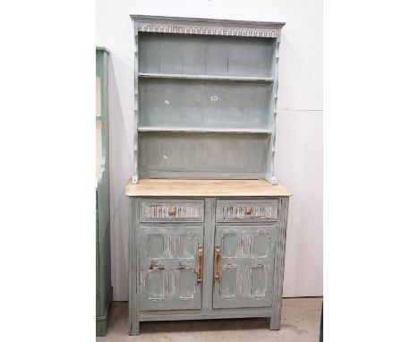 Ercol Part Painted Dresser with plate rack over a stripped elm top and a base of two drawers and two cupboard doors, 90cm wid