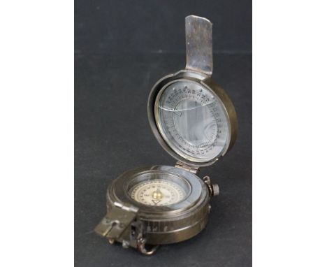 A brass military style marching compass. 