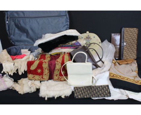 A collection of vintage linen and clothing. 
