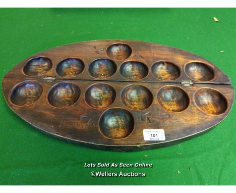 OVAL HINGED TRAY FOR HOLDING BEADS FOR A GAME ORIGINATING IN GHANA&nbsp; [THIS LOT WILL NEED COLLECTING FROM THE ACADEMY BILL