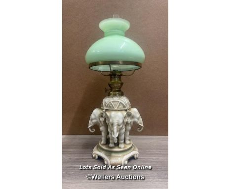 *19TH CENTURY PORCELAIN OIL LAMP BY ALFRED STELLMACHER THE BODY TAKING THE FORM OF FOUR CONJOINED ELEPHANTS. ORIGINATING FROM