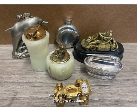 FOUR TABLE LIGHTERS, METAL HIP FLASK AND RACING CAR CLOCK 