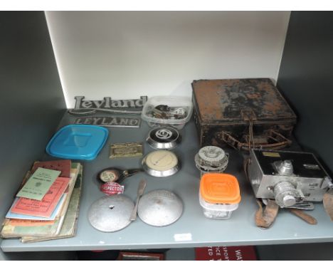 A shelf of Bus related items and ephemera including Setright Ticket Machine in case, Ribble Motor Services Limited Badges, si